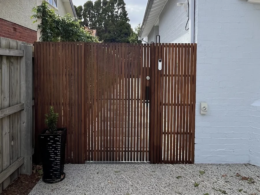 A timber batten gate and screen built by AV Projects Carpentry