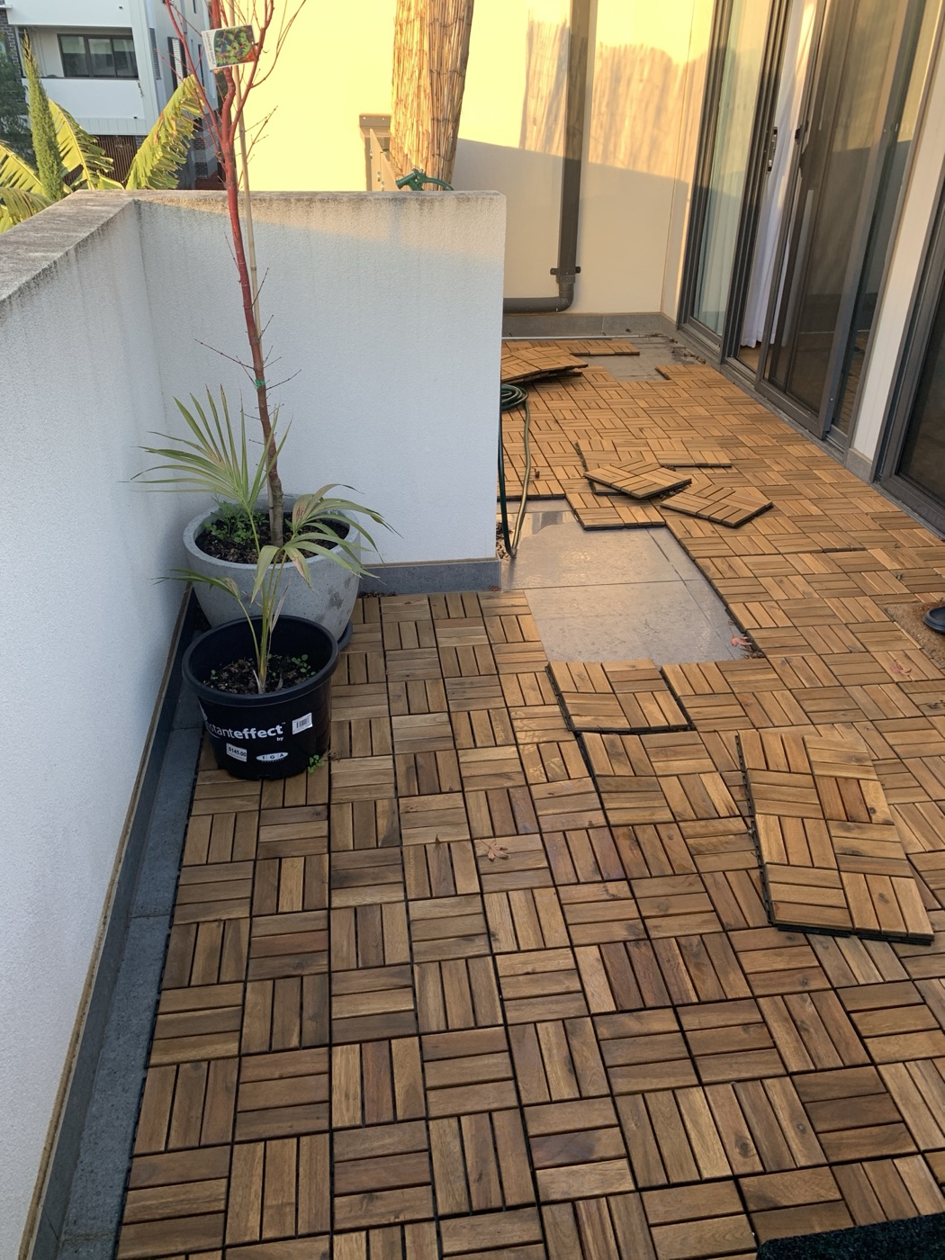 Balcony deck tiles by JT Handyman in Reservoir, VIC