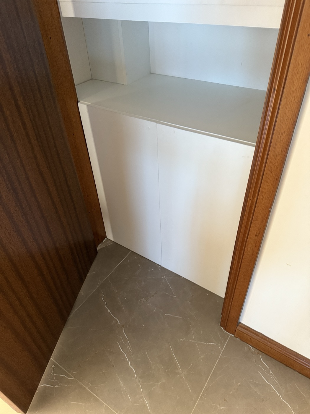 Bathroom cabinet and tiled nook by JT Handyman in Keilor Downs, VIC
