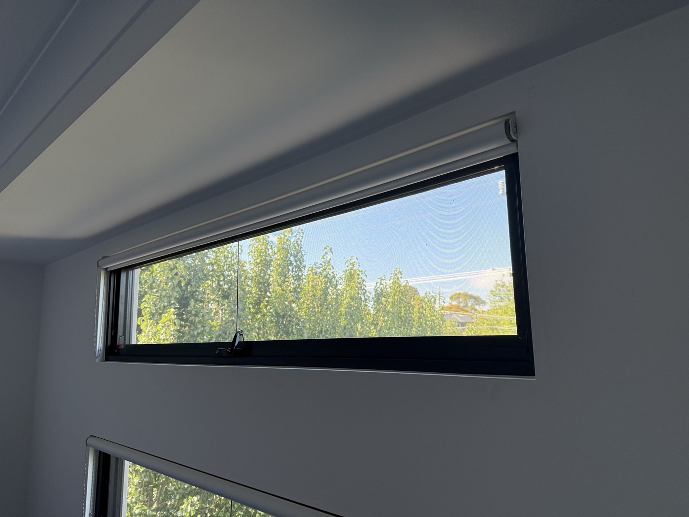 New black-framed window by JT Handyman in Brighton East, VIC