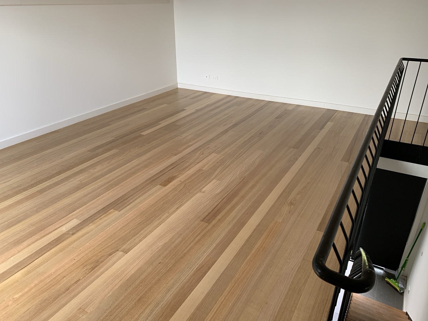 Finished timber floor installed by JT Handyman in Brunswick