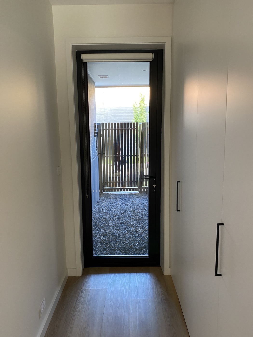 Hallway with new glass courtyard door, carpentry by JT Handyman in Melbourne