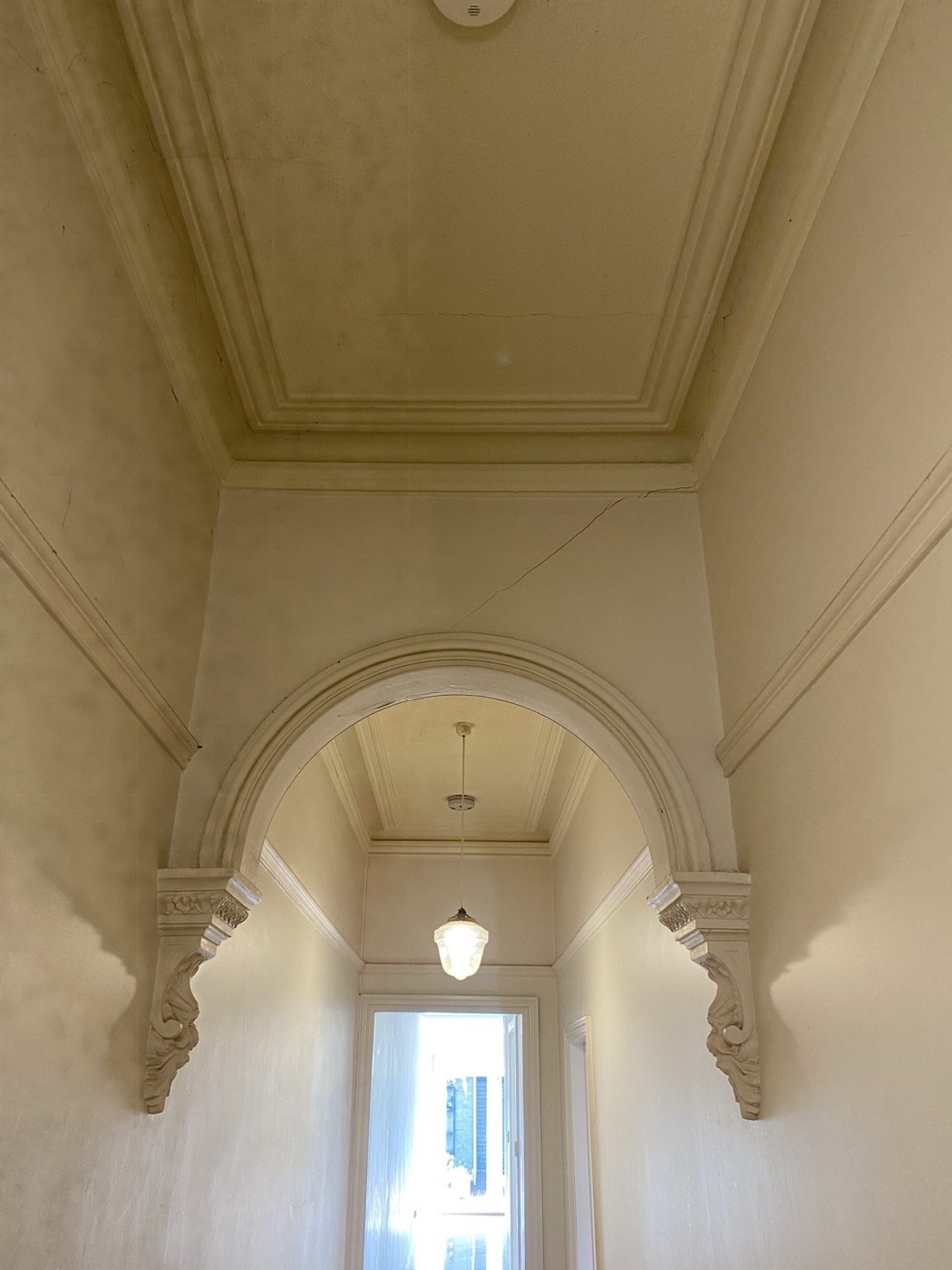 Period hallway arch restoration by JT Handyman in Thornbury, VIC