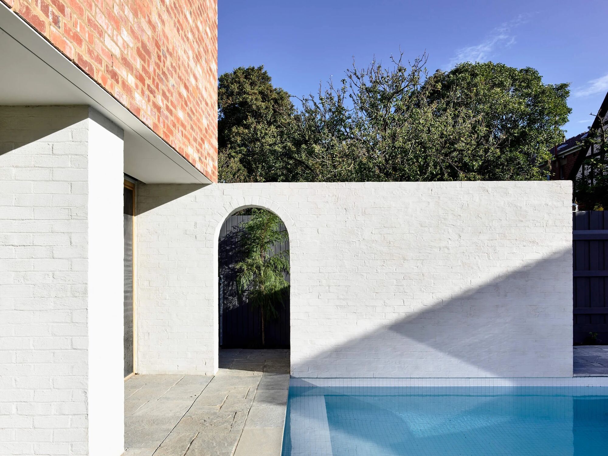 Brick laid with intent as a feature wall carried outside to in