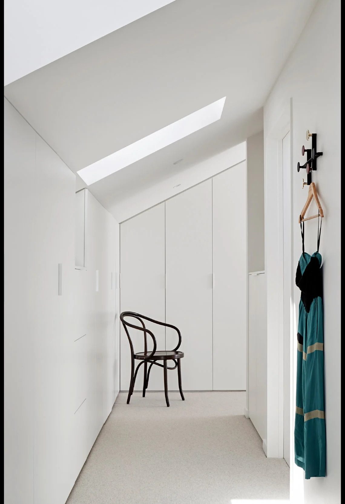 Elwood — a hallway of bespoke cabinetry