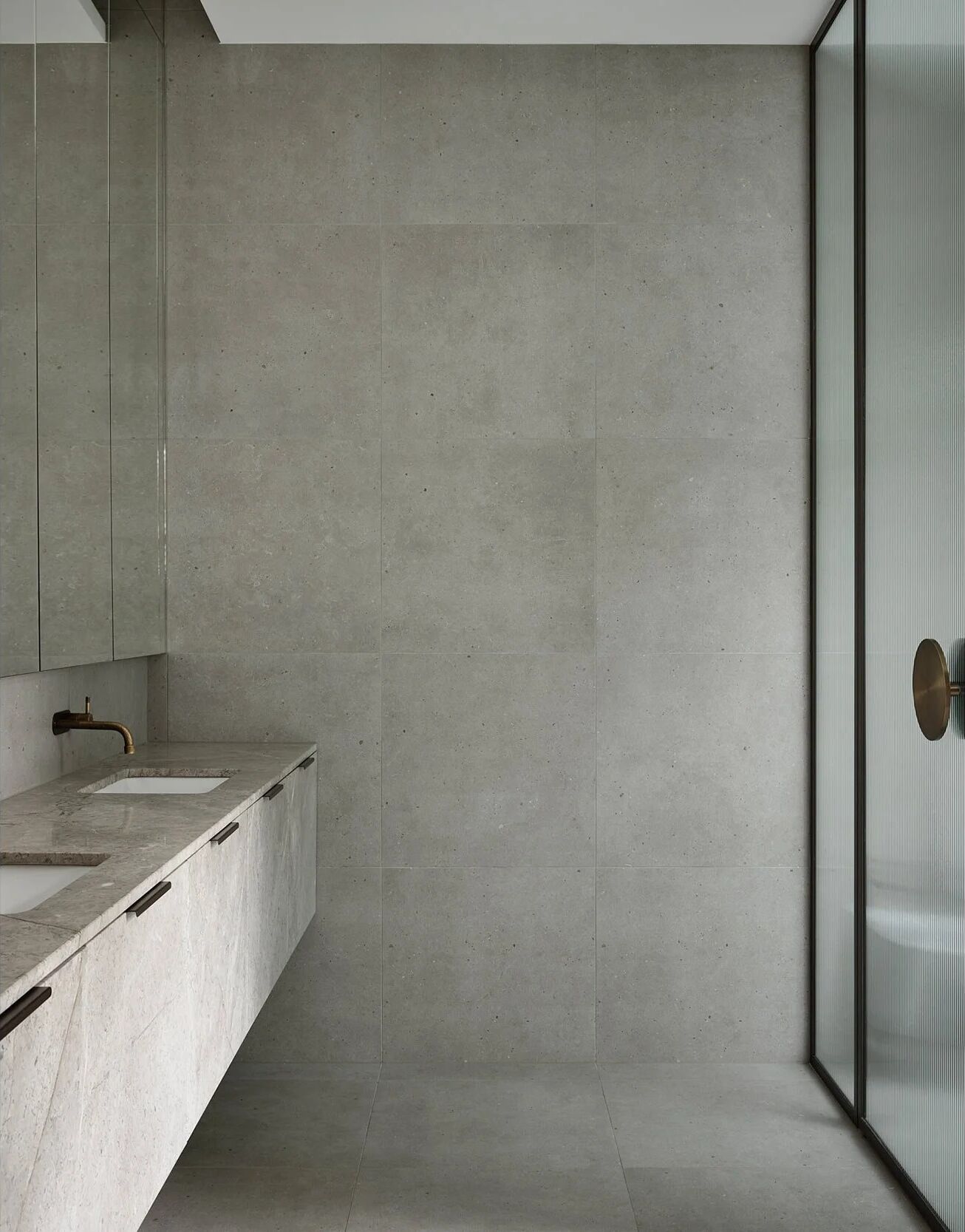 Norman Ave — stone feature-wall bathroom