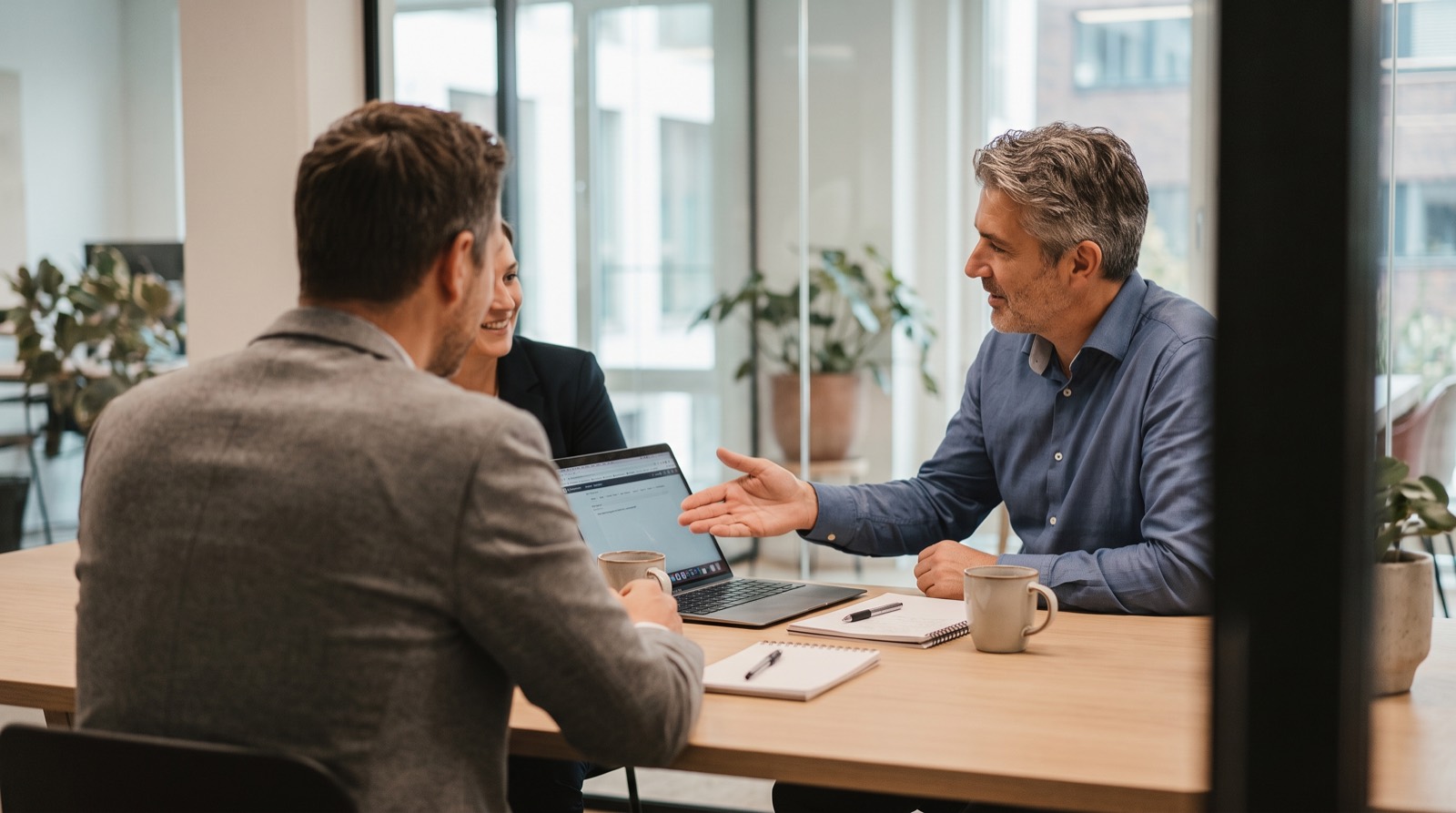 An advisor talking a client through options across a desk