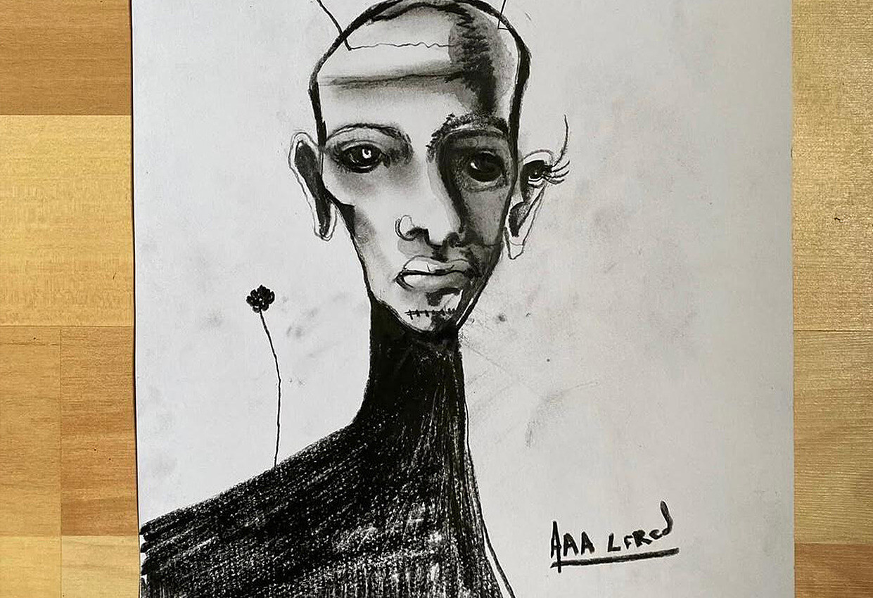 An ink portrait on paper in a black moulding, framed by Studio9Art