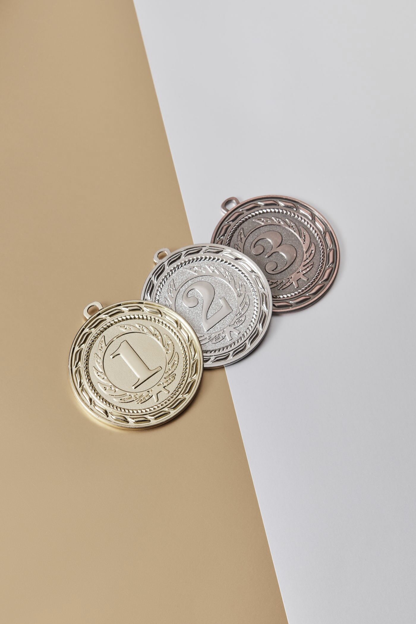 Gold, silver and bronze medals — framed by Studio9Art