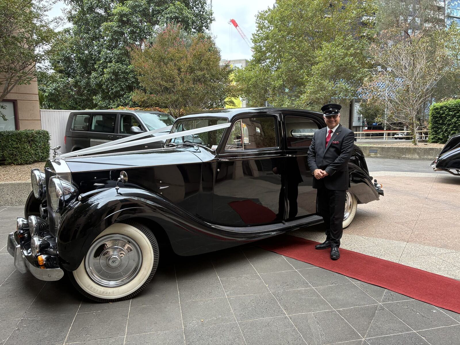 Rolls Royce Wraith, Black, chauffeur at the door
